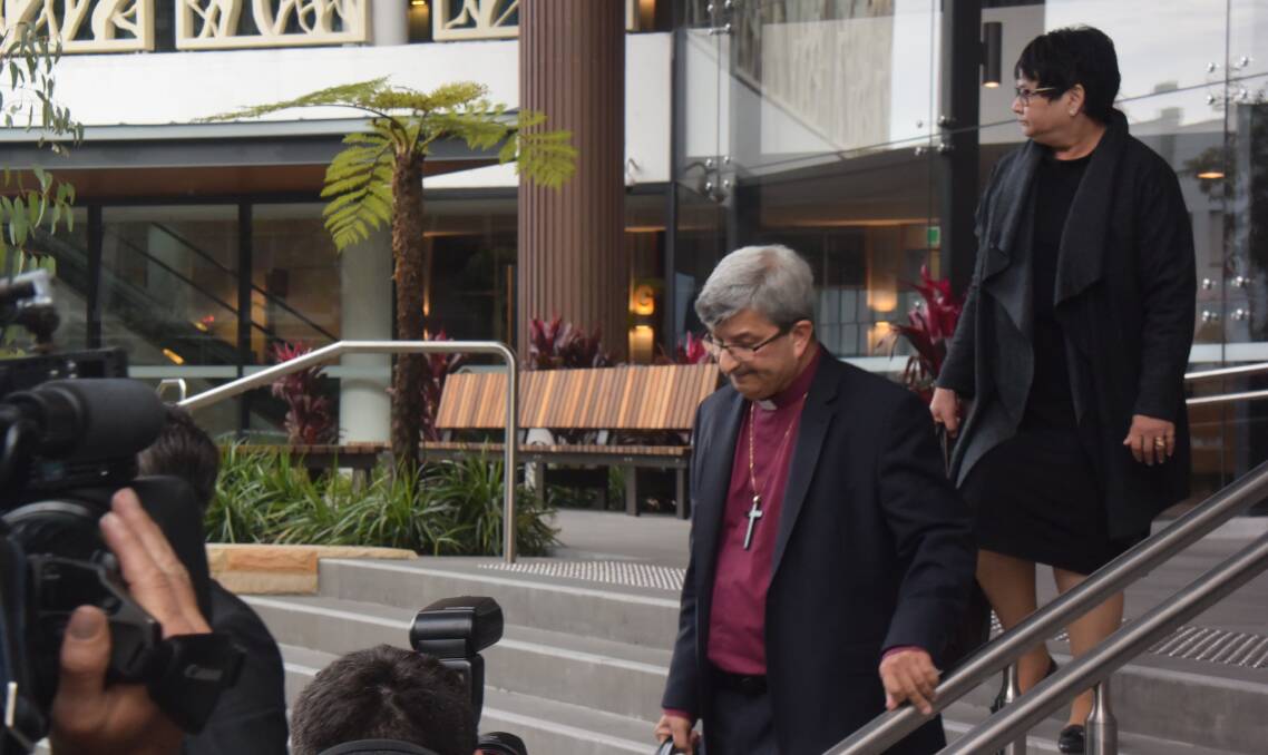 I CANNOT RECALL: Perth Archbishop Roger Herft leaves the Royal Commission on Monday after a second day of evidence in which he admitted to failing to come to grips with child abuse during his time in Newcastle.