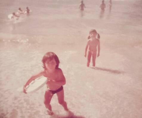 SECOND HOME: Nicky Wood as a toddler, already with a surfcraft under his arm. Picture: Courtesy Rochelle Woods