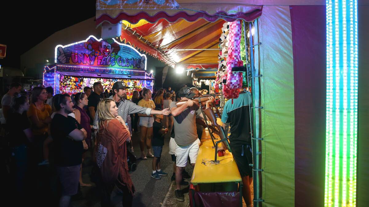 BRIGHT LIGHTS BIG CITY: Sideshow alley in 2019. After a lot of hard work to revive the Newcastle Show, organisers fear the state government's focus is on its housing plans for the Broadmeadow precinct, and little else. Picture: Marina Neil