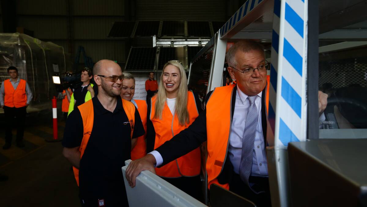 Scott Morrison in an electric mine vehicle at Ampcontrol yesterday.