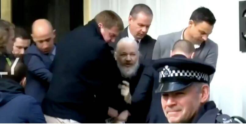 Julian Assange arrested outside the Ecuadorian Embassy in April 2019.