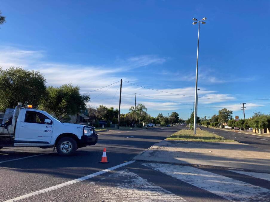 Crime scene: Goonoo Goonoo Road in Tamworth has been shut down as the police operation continues after the stabbing on Saturday morning. Photo: Madeline Link