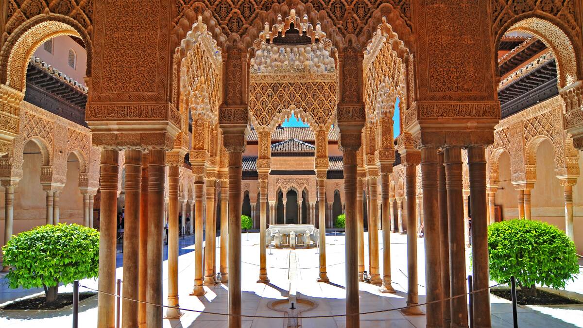 Moorish architecture of the Court of the Lions, the Alhambra, Granada. 