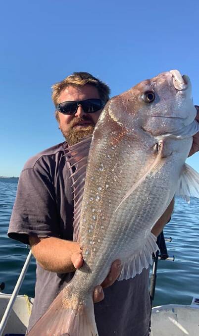 FISH OF THE WEEK: Ian Woolmer wins the Jarvis Walker tacklebox and Tsunami lure pack for this 71cm snapper hooked in Lake Macquarie.