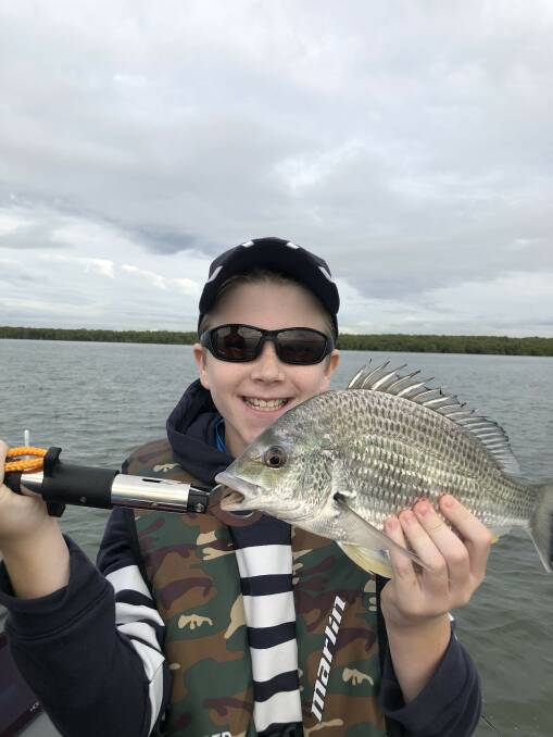 FISH OF THE WEEK: Oliver Mould wins the Jarvis Walker tacklebox and Tsunami lure for this bream, his first ever, hooked in the Hunter River on Wednesday. 