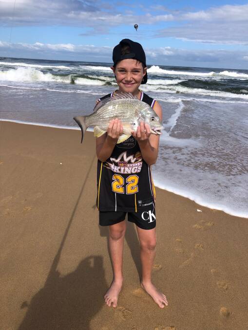 FISH OF THE WEEK: Ashton Hair from Raymond Terrace wins $45 courtesy of Sandgate Tackle Power for this 46cm bream caught on Stockton beach recently.