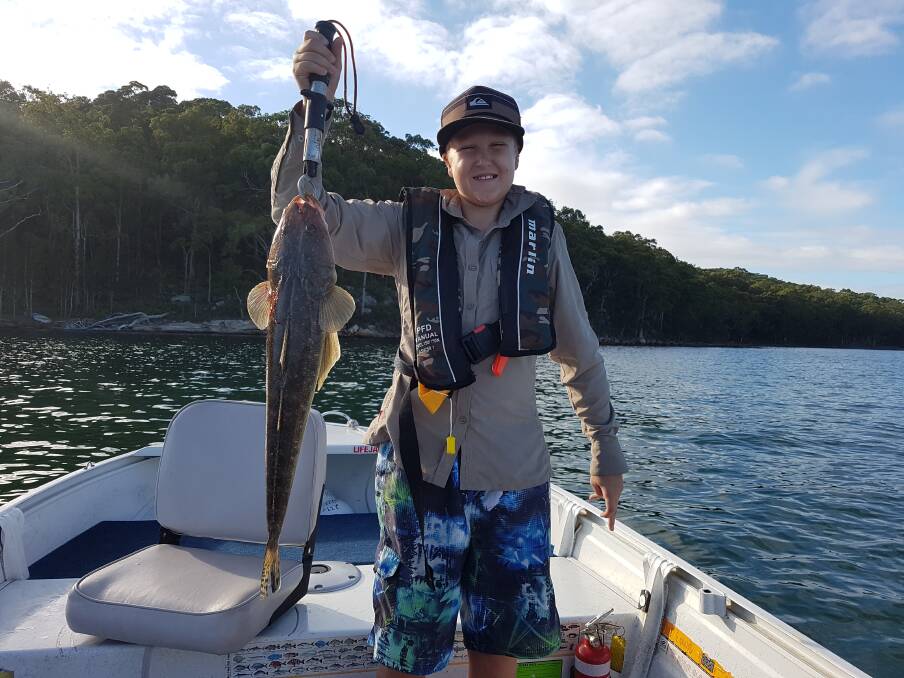 FISH OF THE WEEK: Jackson King, from Singleton, wins the prize this week for this 65cm PB flathead hooked in Lake Macquarie last weekend drifting a prawn.