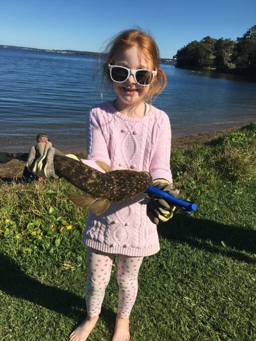 FISH OF THE WEEK: Six-year-old Xanthe Ward wins $45 courtesy of Sandgate Tackle Power for this flathead hooked in Lake Macquarie recently.