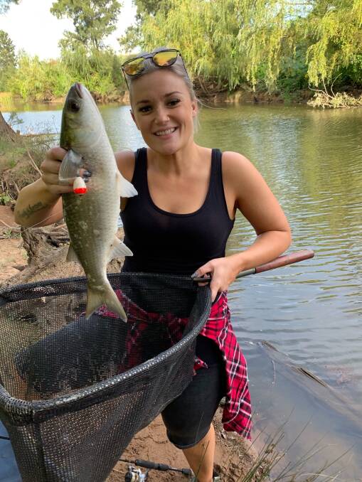 FISH OF THE WEEK: Cindy Parker from Rutherford wins the Jarvis Walker tacklebox and Tsunami lure for this 50cm mullet caught in the Hunter River this week.