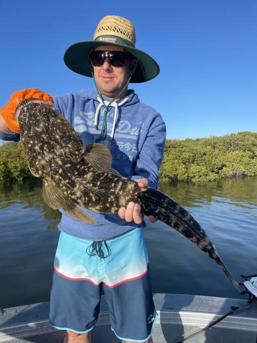 FISH OF THE WEEK: Damien Berragewins $45 courtesy of Sandgate Tackle Power for this 80cm flathead caught and released in Port Stephens recently.