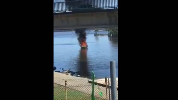 Boat catches  fire at Budgewoi on Australia Day