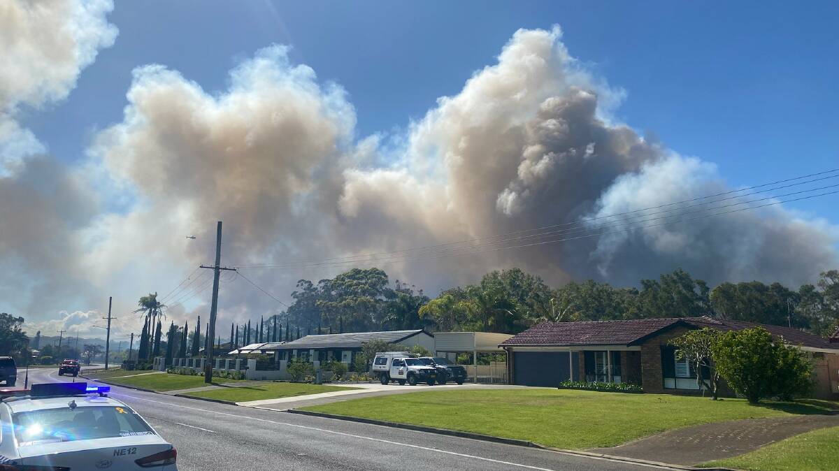 A fire in Salamander Bay in the Port Stephens LGA. The fire continued to burn towards Compass Cl, Admiral Cl & Mariner Cres on the northern side of Salamander Way on Tuesday. Picture by NSW RFS