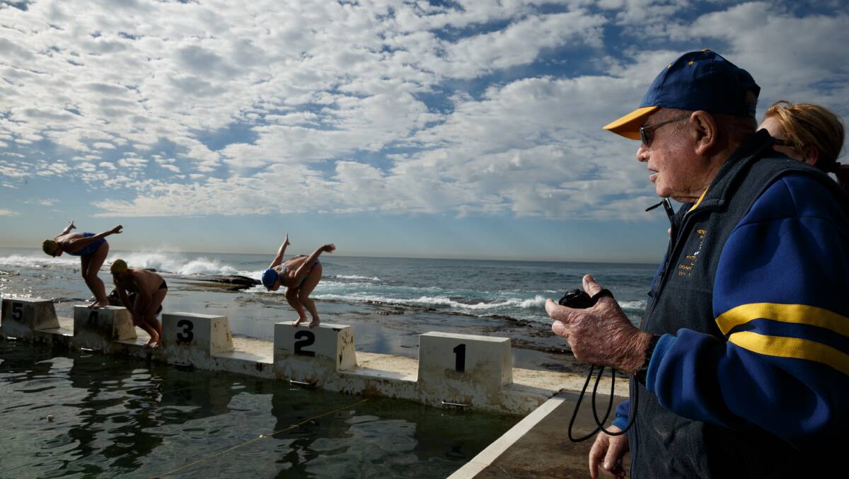 NEWCASTLE: Alf helping out at the final Mackerals swim of the year. Picture: Max Mason-Hubers