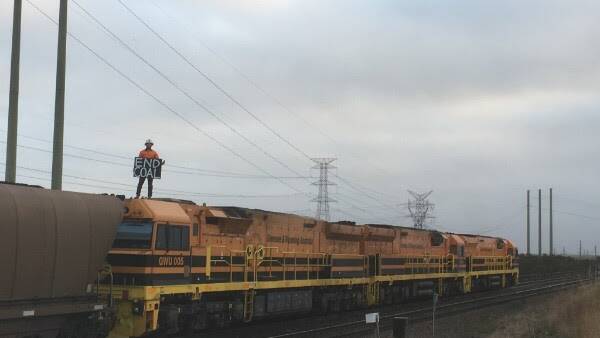 Former coal miner stops trains into Newcastle port in latest protest