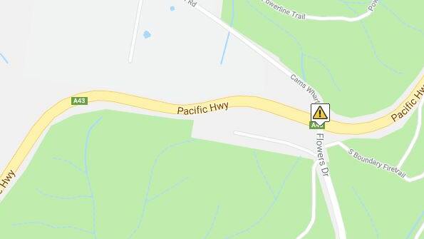 One person has died in a serious two-car crash on the Pacific Highway