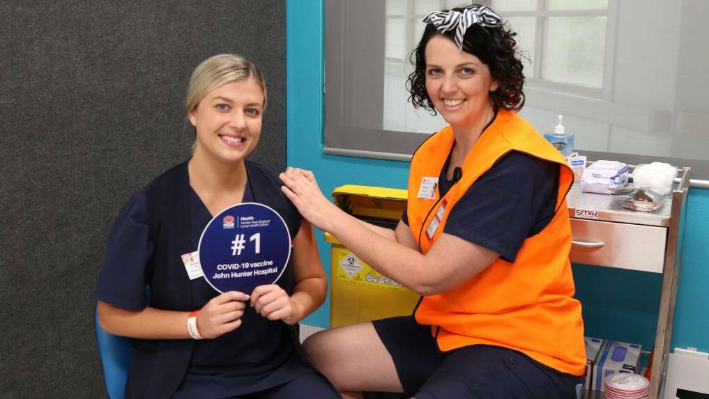 Number one: Nurse unit manager of the COVID ward, Alexandra Mexon, receives the first COVID-19 vaccine at the John Hunter Hospital in March