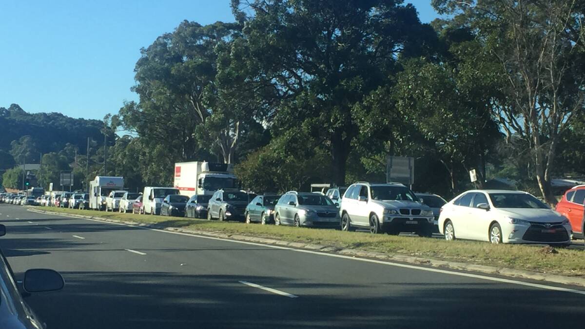 The traffic is backed up southbound on the Pacific Highway.