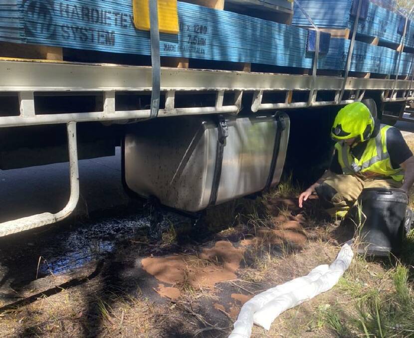 Crews from Raymond Terrace Fire Station arrived on scene to find a truck on the side of the road leaking diesel fuel. Picture: FRNSW