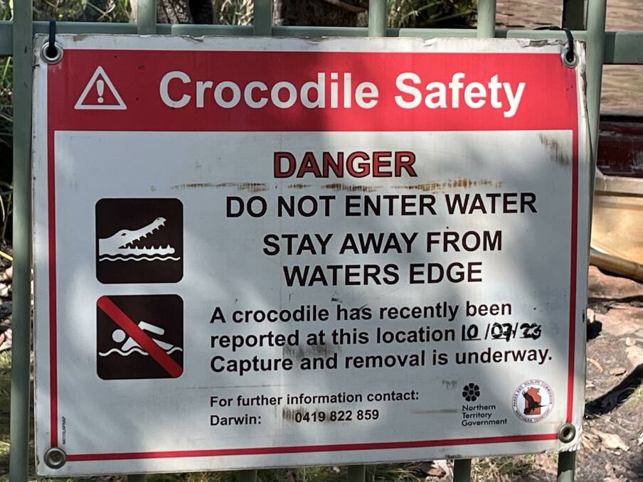 The sign at Wangi Falls has been updated since the attack. Picture by Bruce Kimber