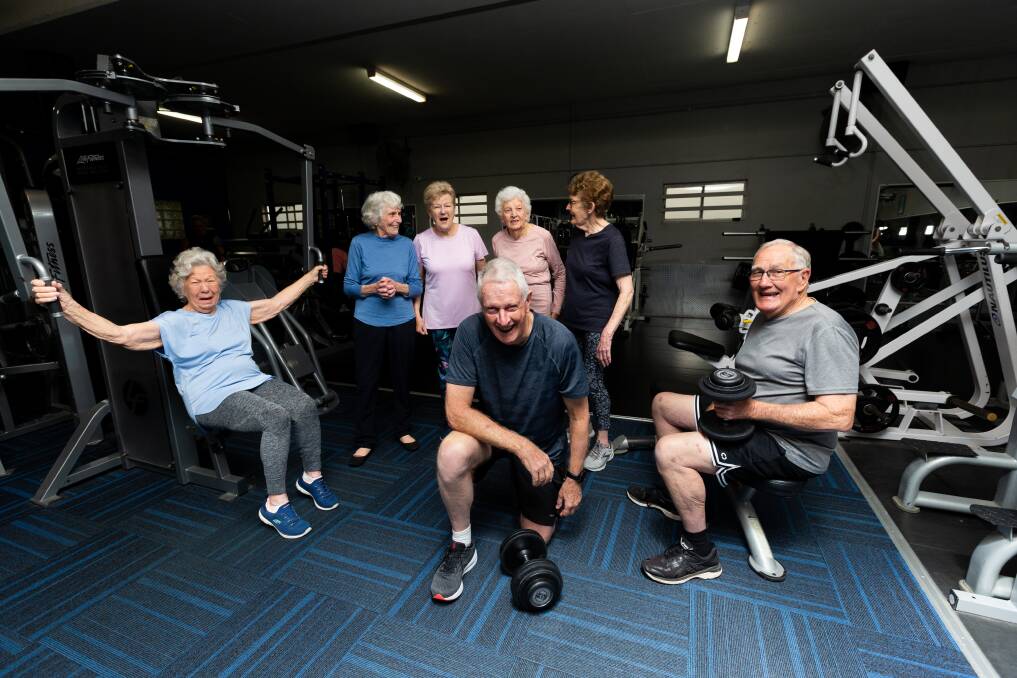 Gillian Clarke, Jean Convery, Anne Malleny, Pat Calvert, Fay Glawson. Graham Rock, front, Bryn Baverstock, right. They are all members of a Warners Bay over 50s exercise group. Picture by Jonathan Carroll