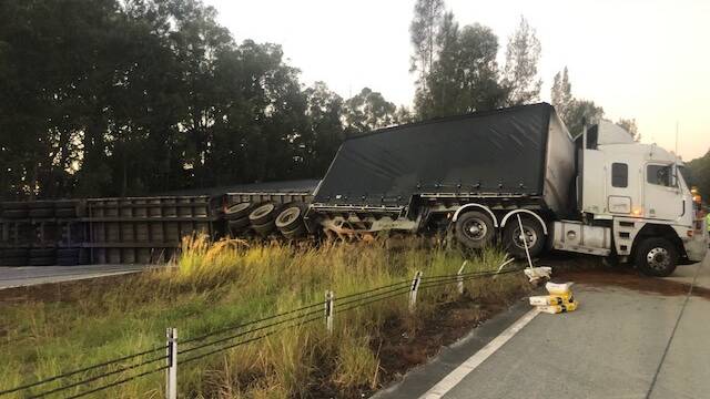 A B-double lost control and crashed just before 5am on Tuesday at Coolongolook. Picture: Live Traffic NSW
