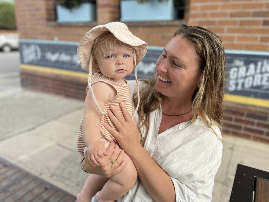 Rose Magin and her daughter Henrietta, 11 months old, have been woken up at 4am every day this week due to track construction. Picture by Jessica Brown