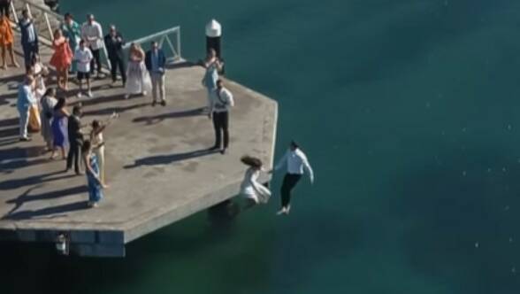 A snippet from the video showing the married couple jump into the ocean. Picture: Instagram 