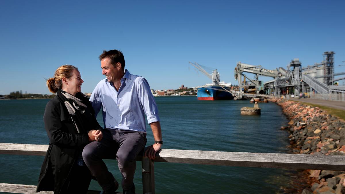 NEWCASTLE: Suzie Galwey and Jock Carter, with a backdrop of the harbour and grain terminal in Carrington. Picture: Simone De Peak