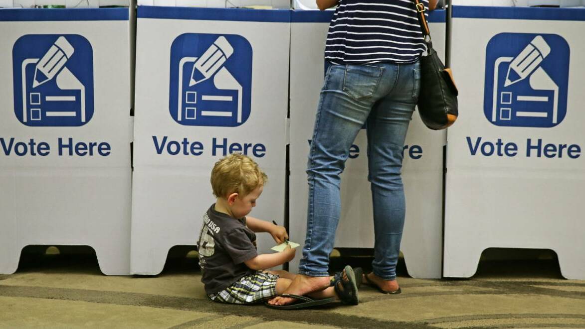 POWER PLAY: A voter casts their ballot at Lake Macquarie council chambers in the 2015 state election. Pictures: Marina Neil