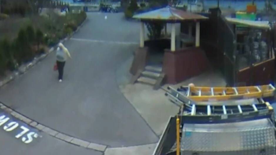 CCTV showed Ms Devine leaving a hotel in Katoomba wearing a bright yellow cardigan.