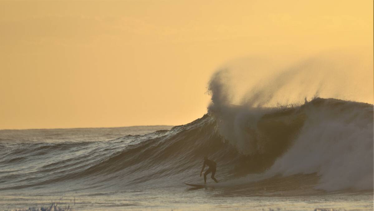 SNAPPED: An early-morning wave off Merewether Beach earlier this month before the rains hit. Picture: Dave Anderson