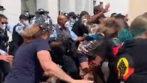 Police and protesters clash at Parliament House on Thursday morning. Picture: Instagram