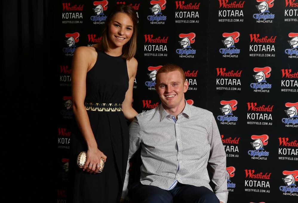 NEW CHALLENGE: Alex McKinnon and his wife, Teigan. Picture: Jonathan Carroll