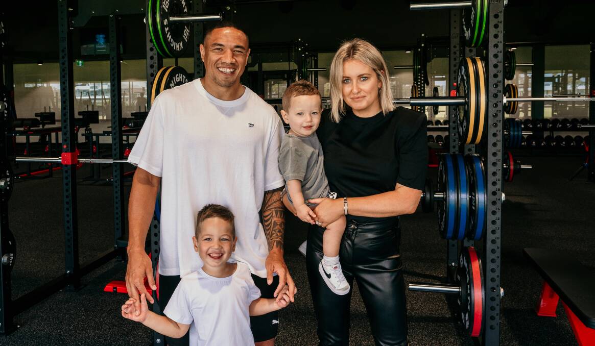 FAMILY MAN: Tyson Frizell, who plays his 200th NRL game on Friday, with wife Sammy and sons Axton and Easton. Picture: Knights Media