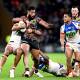 POWER GAME: Newcastle players struggle to bring down Brisbane prop Payne Haas at Suncorp Stadium on Saturday night. Picture: Getty Images