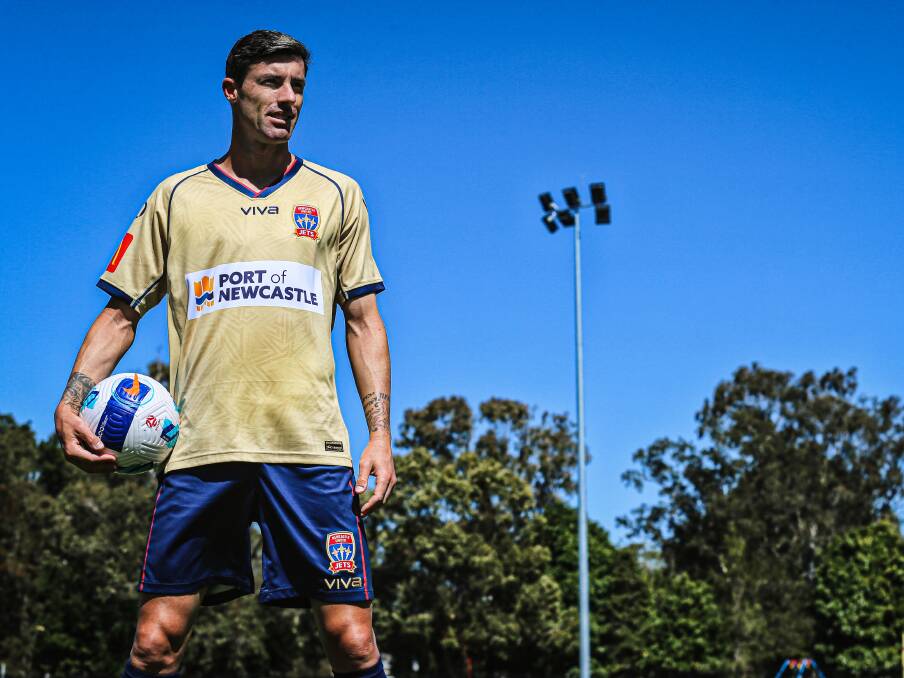PASSION: Jason Hoffman in the traditional gold jersey the Jets will wear this season. Picture: Sproule Sports Focus