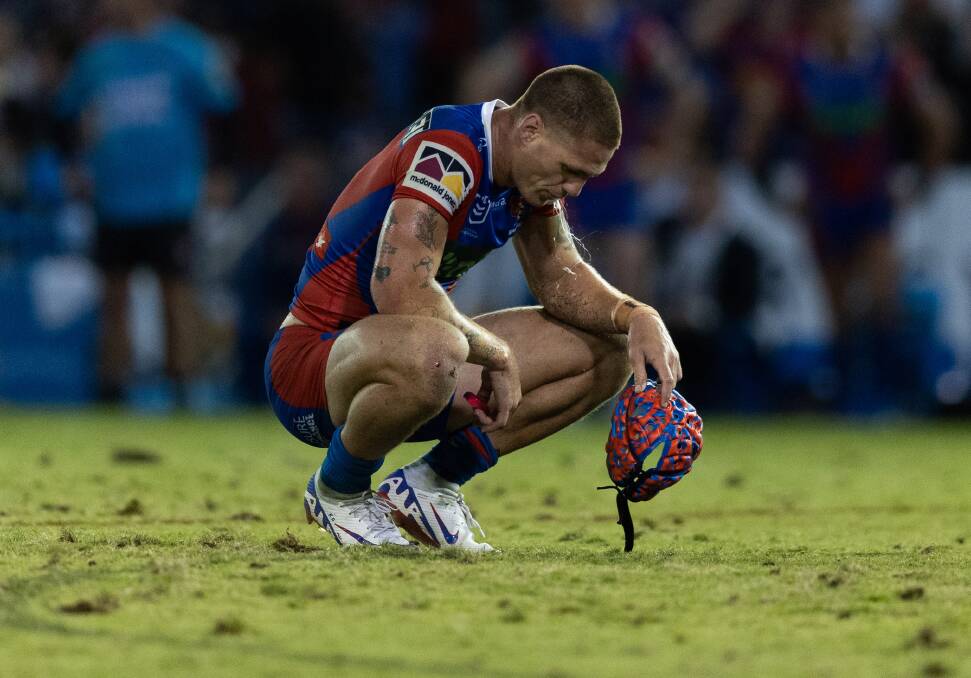 Knights skipper Kalyn Ponga in a world of hurt at full-time. Pictures by Jonathan Carroll and Peter Lorimer