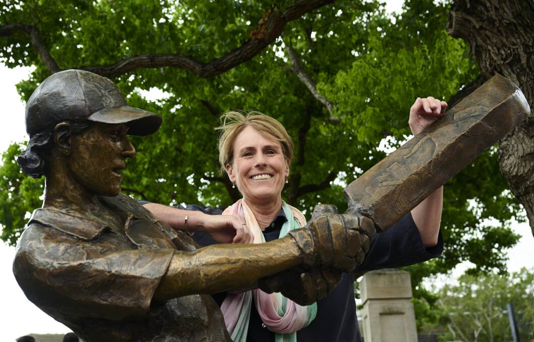 Newcastle's former Australian cricket captain Belinda Clark with her new statue, which was unveiled at the SCG this week. Picture by Getty Images