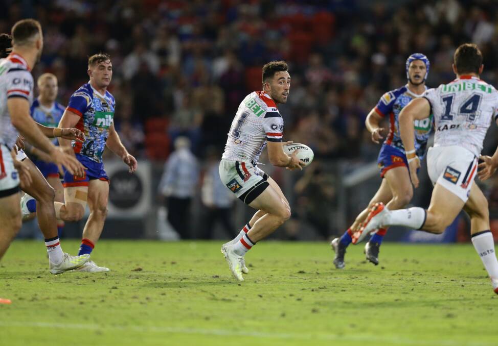 HOME AND AWAY: Brock Lamb playing his only NRL game for the Roosters, against his former Knights teammates in May. He has now signed to join London Broncos. Picture: Jonathan Carroll