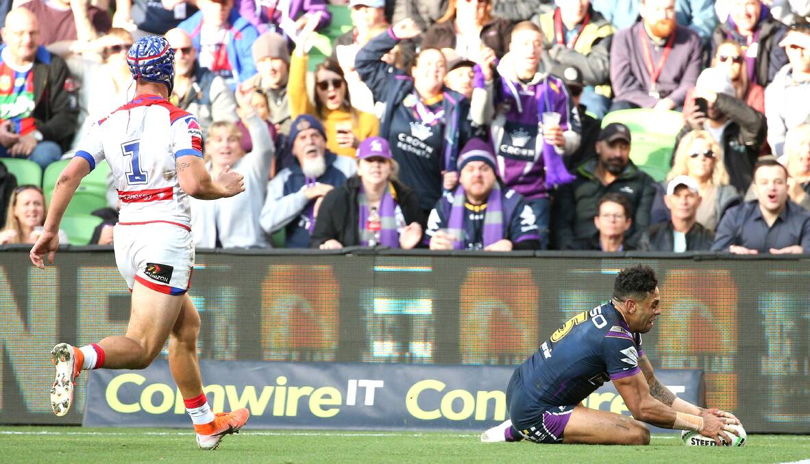 DAYLIGHT SECOND: Newcastle's Kalyn Ponga arrives too late to prevent Melbourne's Josh Addo-Carr scoring at AAMI Park on Saturday. Picture: AAP
