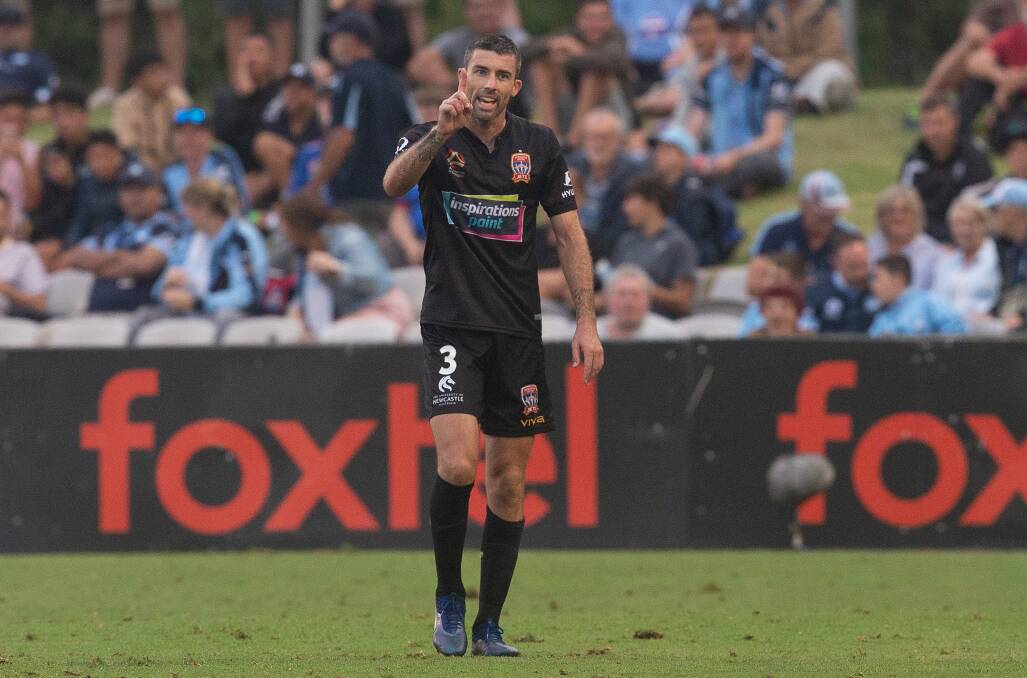 MAKING A POINT: Newcastle defender Jason Hoffman protests his innocence after being sent off for a clash with Sydney FC's Brandon O'Neill on Saturday. Pictures: AAP