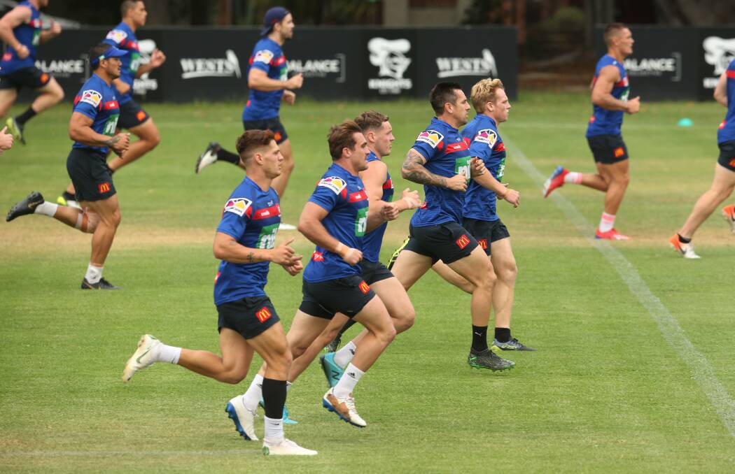 BACK IN ACTION: Kurt Mann, third from right, joins his Newcastle teammates during their first training session of 2020. Picture: Simone De Peak