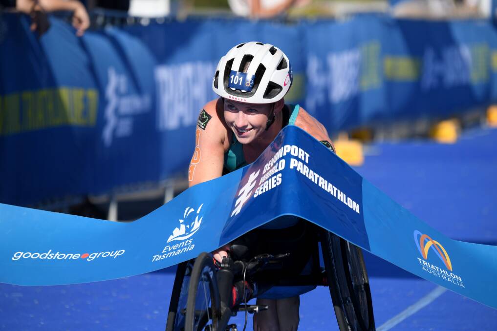 MOTIVATED: Newcastle paratriathlete Lauren Parker will try to also qualify for cycling events at the Toyko Paralympics, which will now be held in August and September next year. Picture: Getty Images