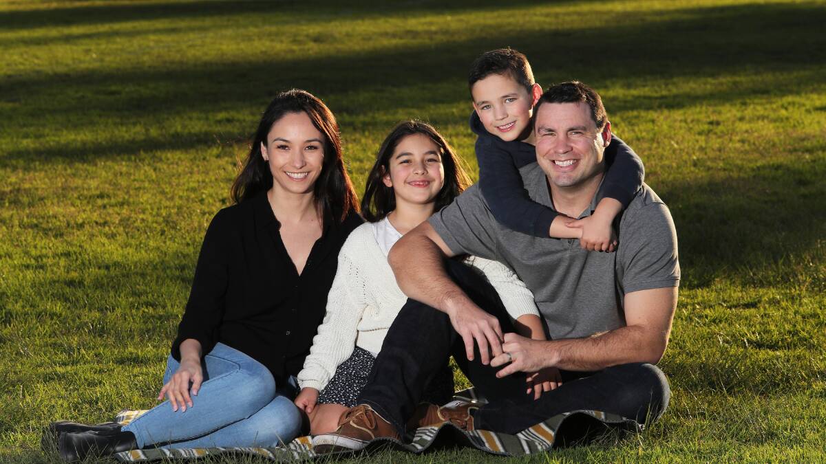 FAMILY MAN: James McManus with wife Eshia and children Emelyn and Jyden. Picture: Peter Lorimer