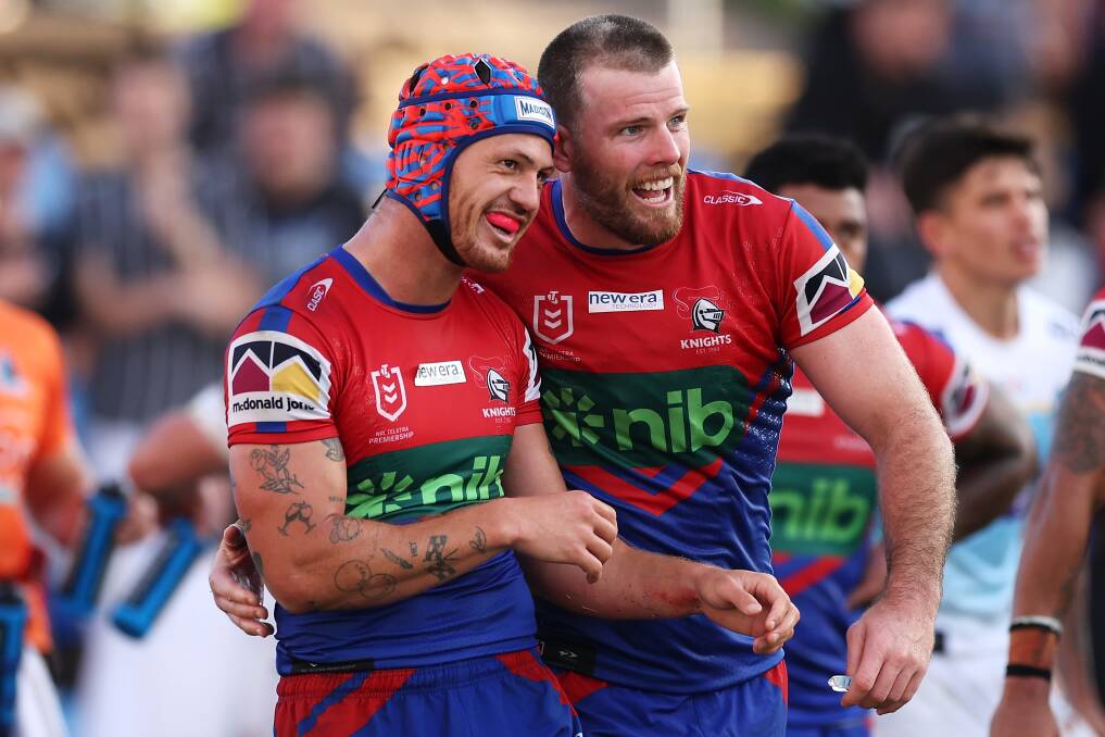 Lachlan Fitzgibbon congratulates Kalyn Ponga after his try against the Titans. Picture by Getty Images