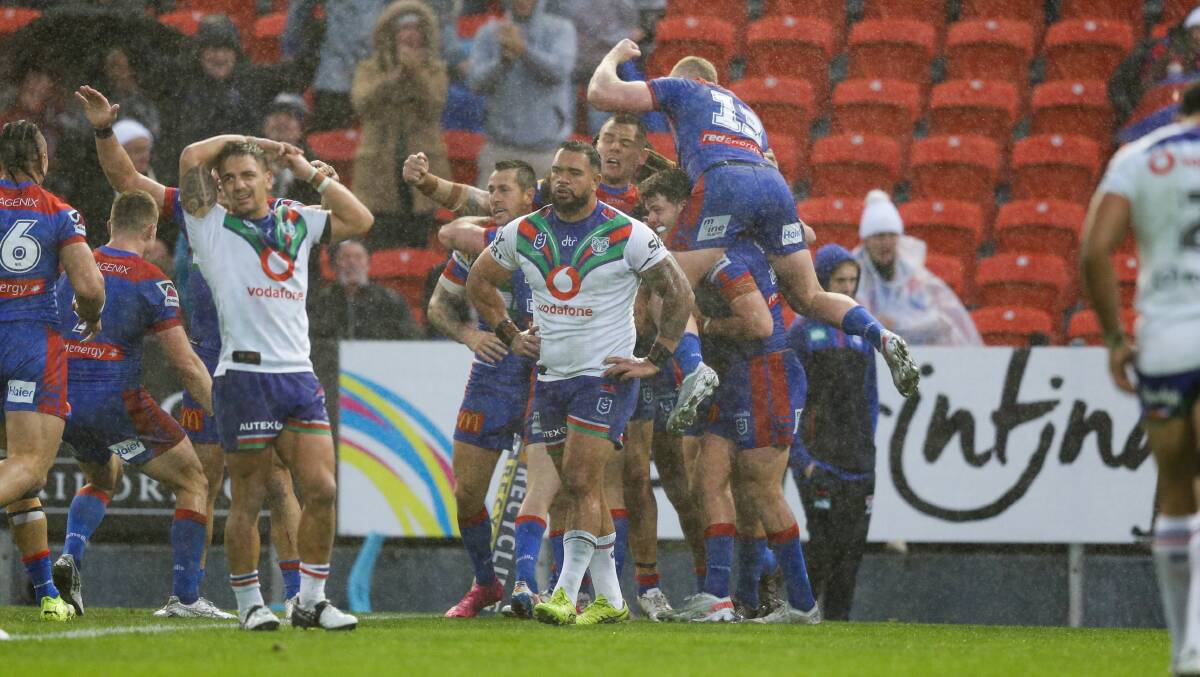 YOU BEAUTY: The Knights celebrate Brodie Jones' matchwinning try. Picture: Jonathan Carroll