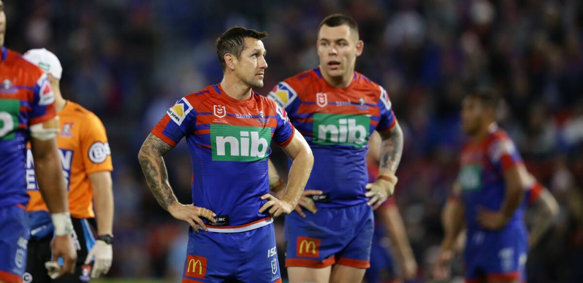 FRUSTRATION: Knights skipper Mitchell Pearce and prop David Klemmer are a picture of disappointment after Friday's 28-26 loss to the Tigers. Picture: Jonathan Carroll