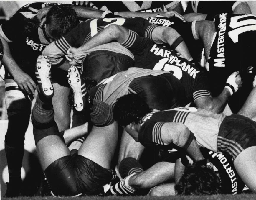 THE GOOD OLD DAYS: How the rugby league scrum used to look, back before wingers were entrusted with feeding the ball in.