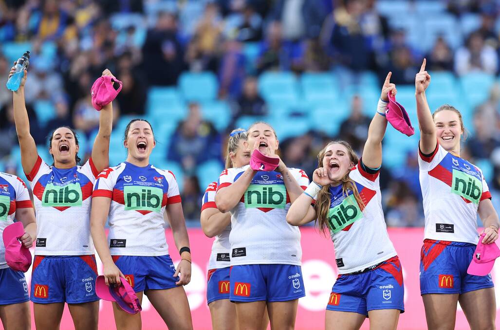 Newcastle players whoop it up as Tamika Upton collects the Karyn Murphy Medal as player of the match. Picture Getty Images