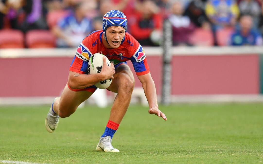 MAGICIAN: Kalyn Ponga dives over for a try against Canterbury after bamboozling Kieran Foran with one of the best sidesteps you will see. Picture: AAP